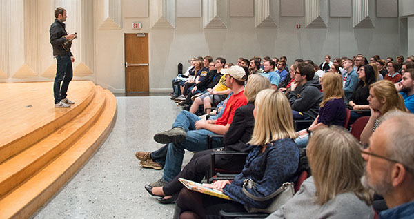 Chris Thile speaks to students in lecture hall